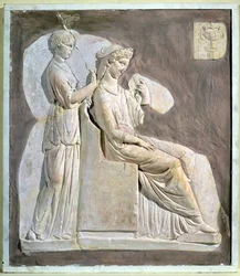 Relief, das eine Frau bei ihrer Toilette darstellt, aus Tunesien